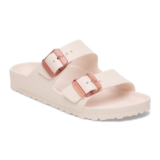 Minimalist Birkenstock Arizona EVA sandals with tonal stealth buckles, lightweight waterproof two-strap design, worn casually for beach or everyday comfort