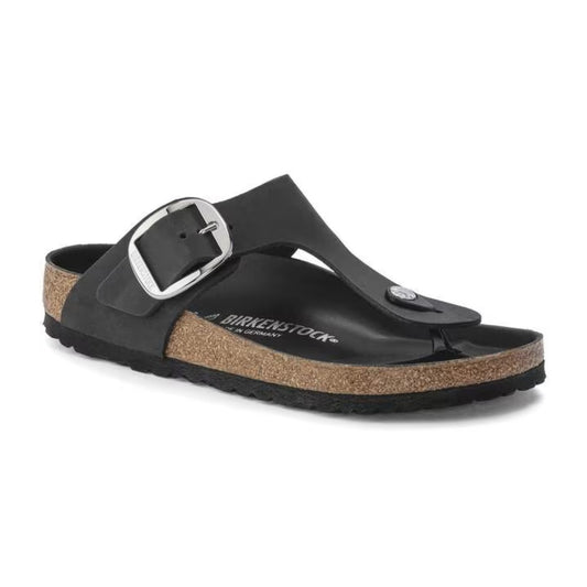 Birkenstock Gizeh Big Buckle sandals featuring a thong-style strap with a large metal buckle and contoured cork footbed, styled for chic summer wear