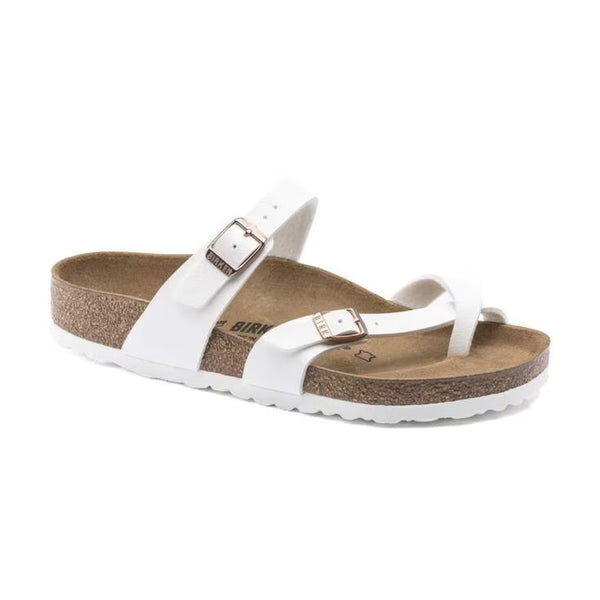 Birkenstock Mayari sandals with toe-loop design and adjustable straps, featuring a contoured cork footbed, worn casually for comfortable everyday style