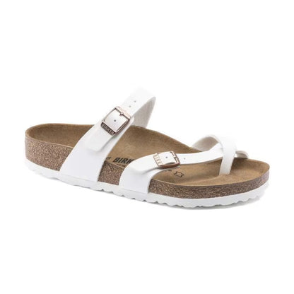 Birkenstock Mayari sandals with toe-loop design and adjustable straps, featuring a contoured cork footbed, worn casually for comfortable everyday style