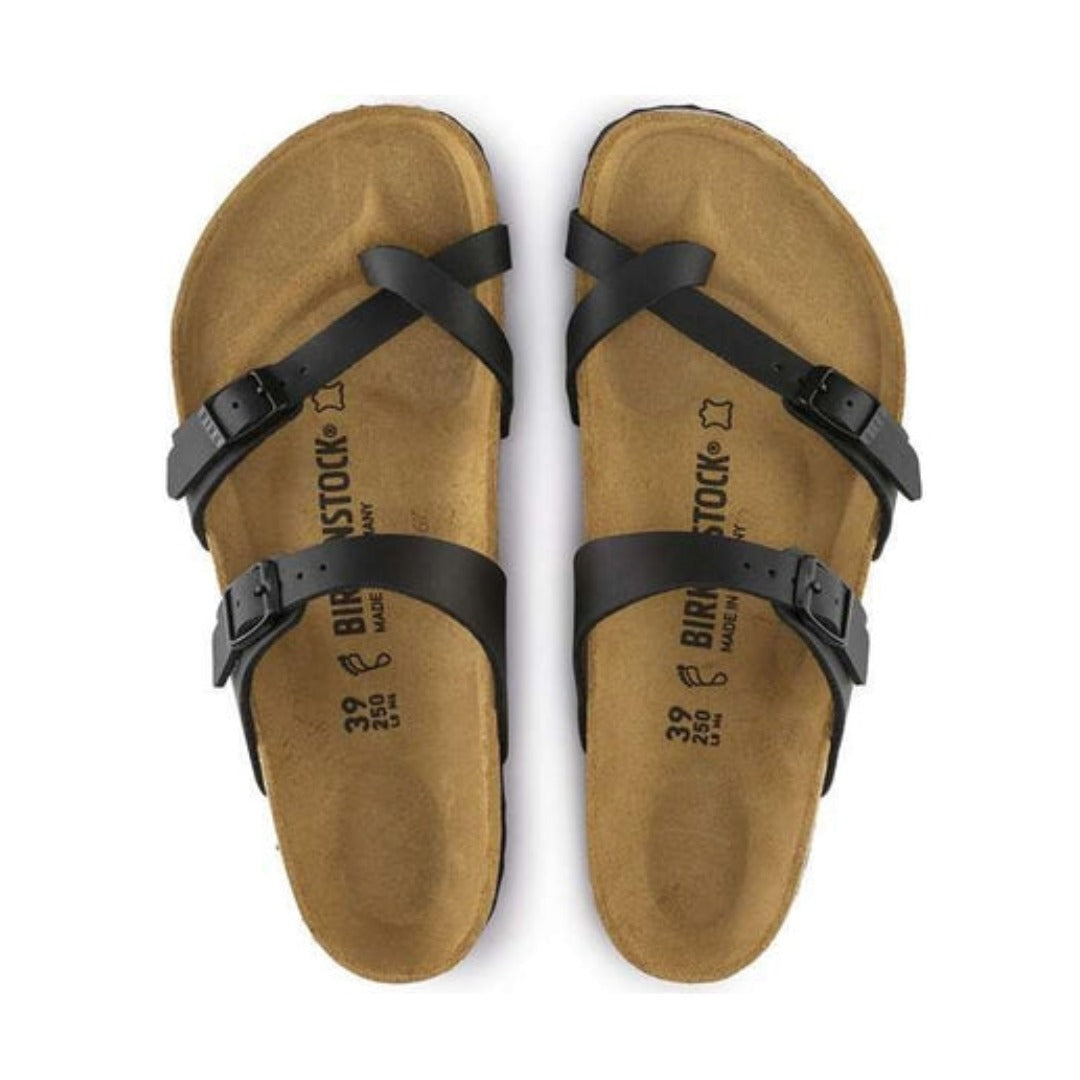 Toe-loop sandal featuring adjustable straps, a contoured cork-latex footbed, and a lightweight open design for stylish everyday comfort and support