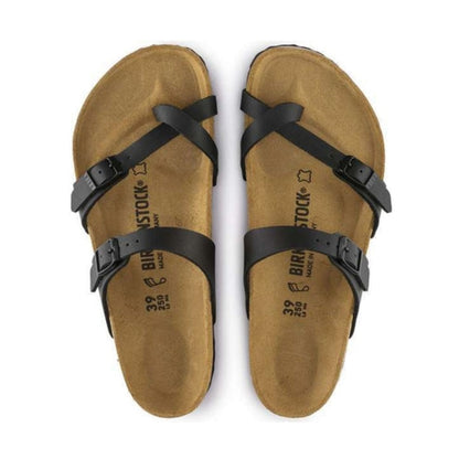 Toe-loop sandal featuring adjustable straps, a contoured cork-latex footbed, and a lightweight open design for stylish everyday comfort and support