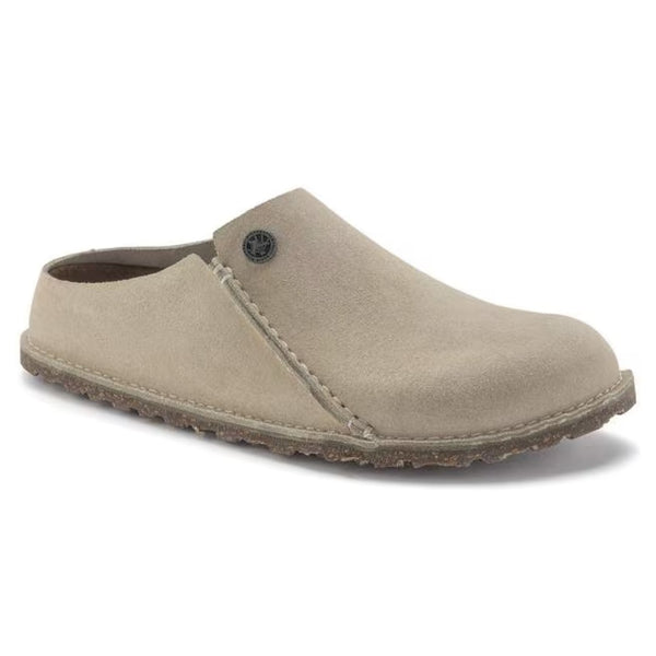 Premium suede slipper featuring a closed-toe slip-on design, contoured cork-latex footbed, and soft construction for comfortable indoor and casual wear