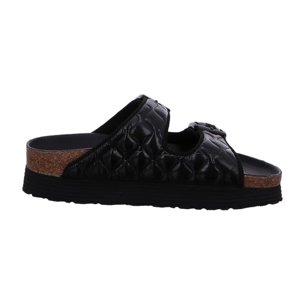 Platform sandal featuring padded dual straps, adjustable buckles, a contoured cork-latex footbed, and a black elevated sole for stylish everyday comfort