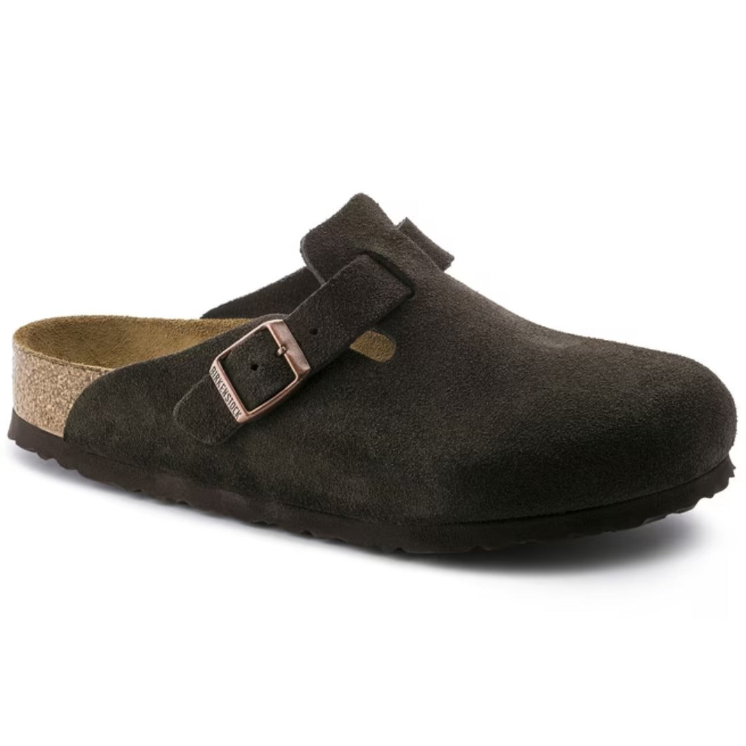 Women wearing Birkenstock Boston Soft Footbed clogs, closed-toe suede slip-on shoes with buckle strap and cushioned cork footbed, styled for casual everyday wear.