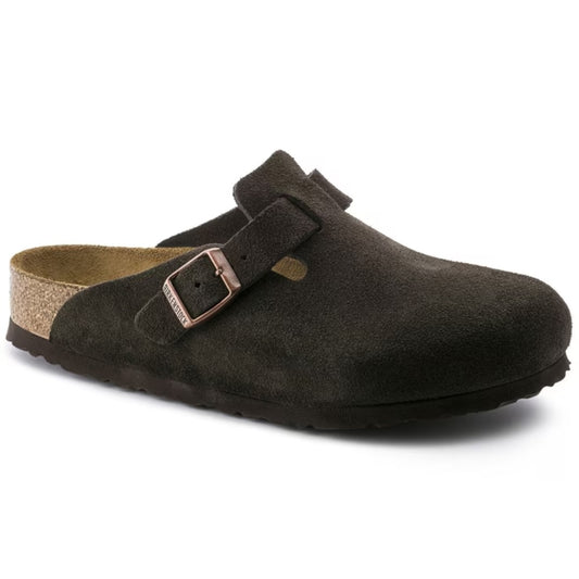 Women wearing Birkenstock Boston Soft Footbed clogs, closed-toe suede slip-on shoes with buckle strap and cushioned cork footbed, styled for casual everyday wear.