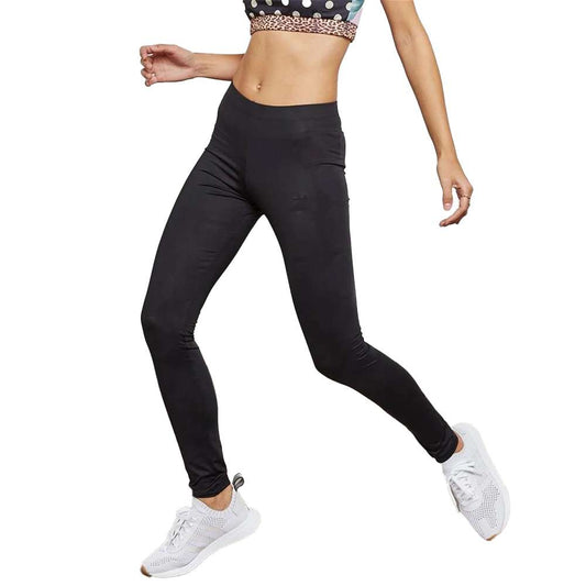 A woman wearing adidas Women's Originals Fashion League Tights