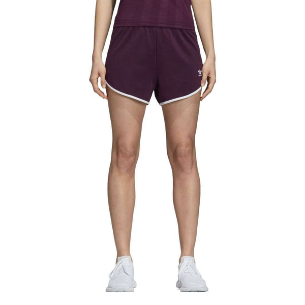 A woman wearing adidas Women's Originals AA-42 Shorts
