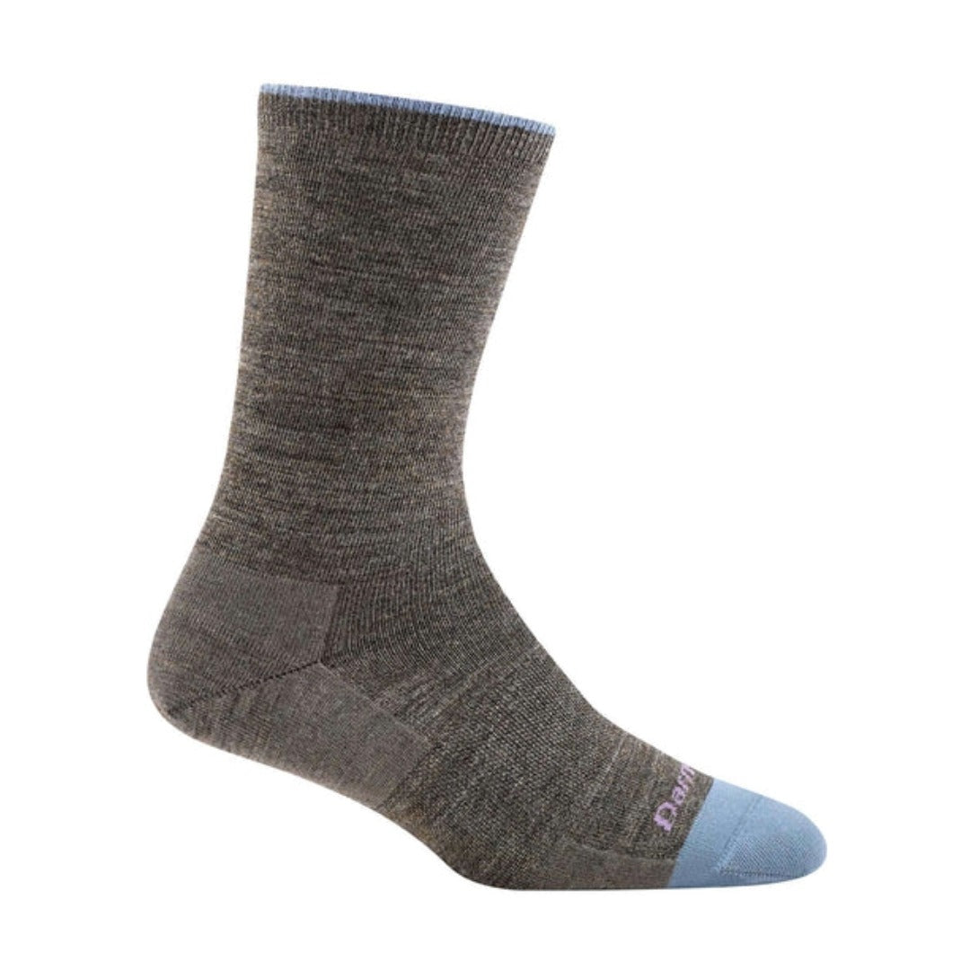Pair of Darn Tough women’s crew socks with a solid color design, lightweight merino wool fabric, and comfortable everyday fit.
