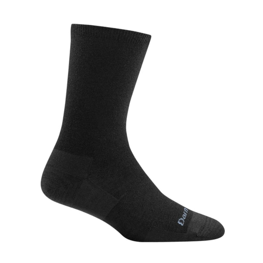 Pair of Darn Tough women’s crew socks with a solid color design, lightweight merino wool fabric, and comfortable everyday fit.