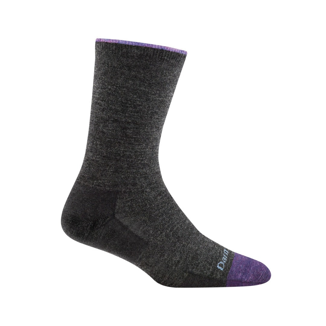 Women’s lightweight crew lifestyle socks featuring soft merino wool construction, breathable everyday comfort, and classic solid-color styling for casual daily wea