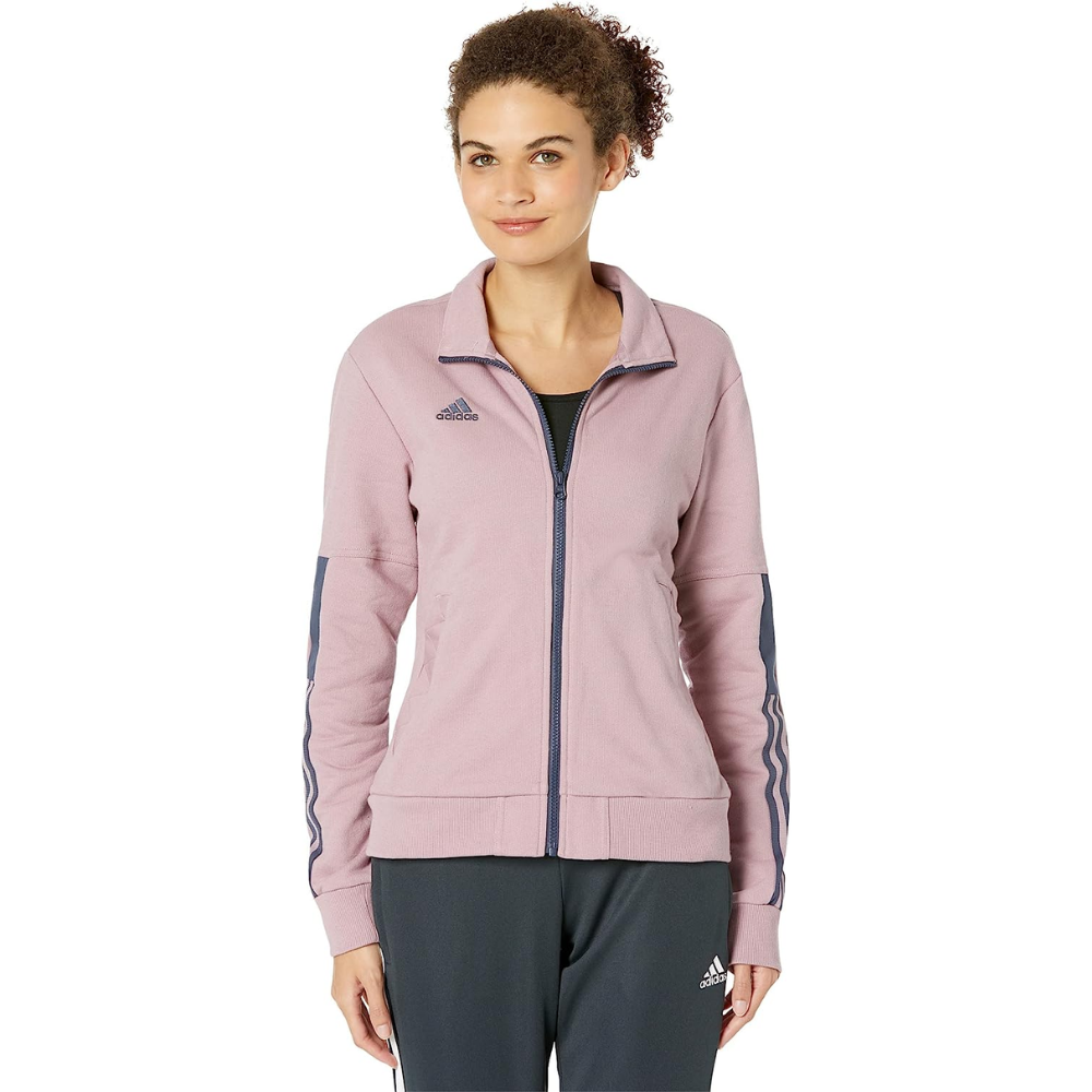 Adidas Women's Tiro Jacket in Magic Mauve, inspired by soccer fan culture and made with 100% cotton French terry.