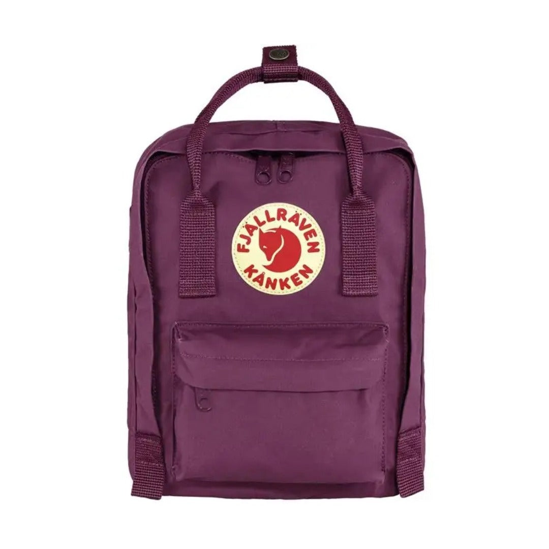 Fjällräven Kånken Sling bag with a compact rectangular shape, adjustable crossbody strap, top handles, and front zip pocket, styled for everyday casual carry