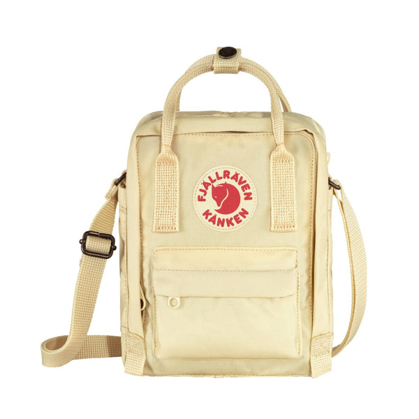 Fjällräven Kånken Sling bag with a compact rectangular shape, adjustable crossbody strap, top handles, and front zip pocket, styled for everyday casual carry