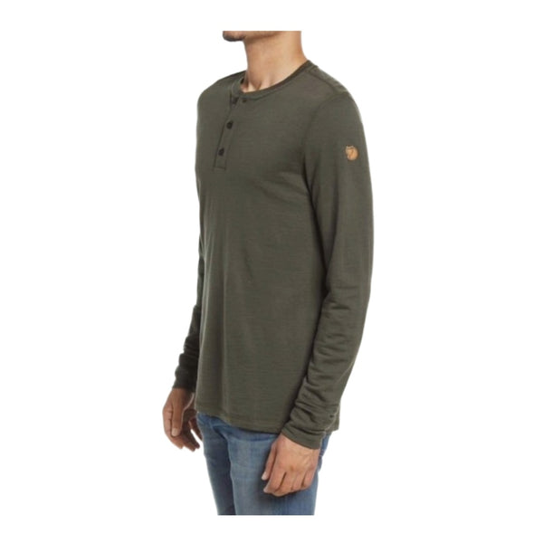 Fjällräven merino wool henley long sleeve shirt with button neckline, lightweight base-layer design, worn for outdoor or casual cold-weather comfort
