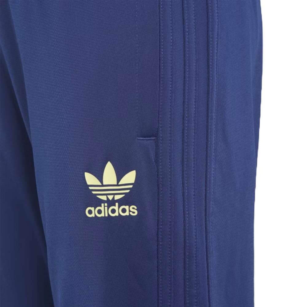 Image of a boy wearing adidas Originals All Over Print Pack Superstar Pants