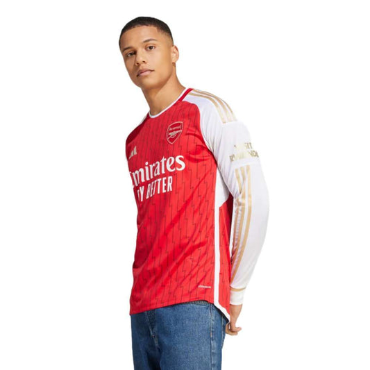 A front view of the adidas ARSENAL 23/24 Long Sleeve Home Jersey in red and white