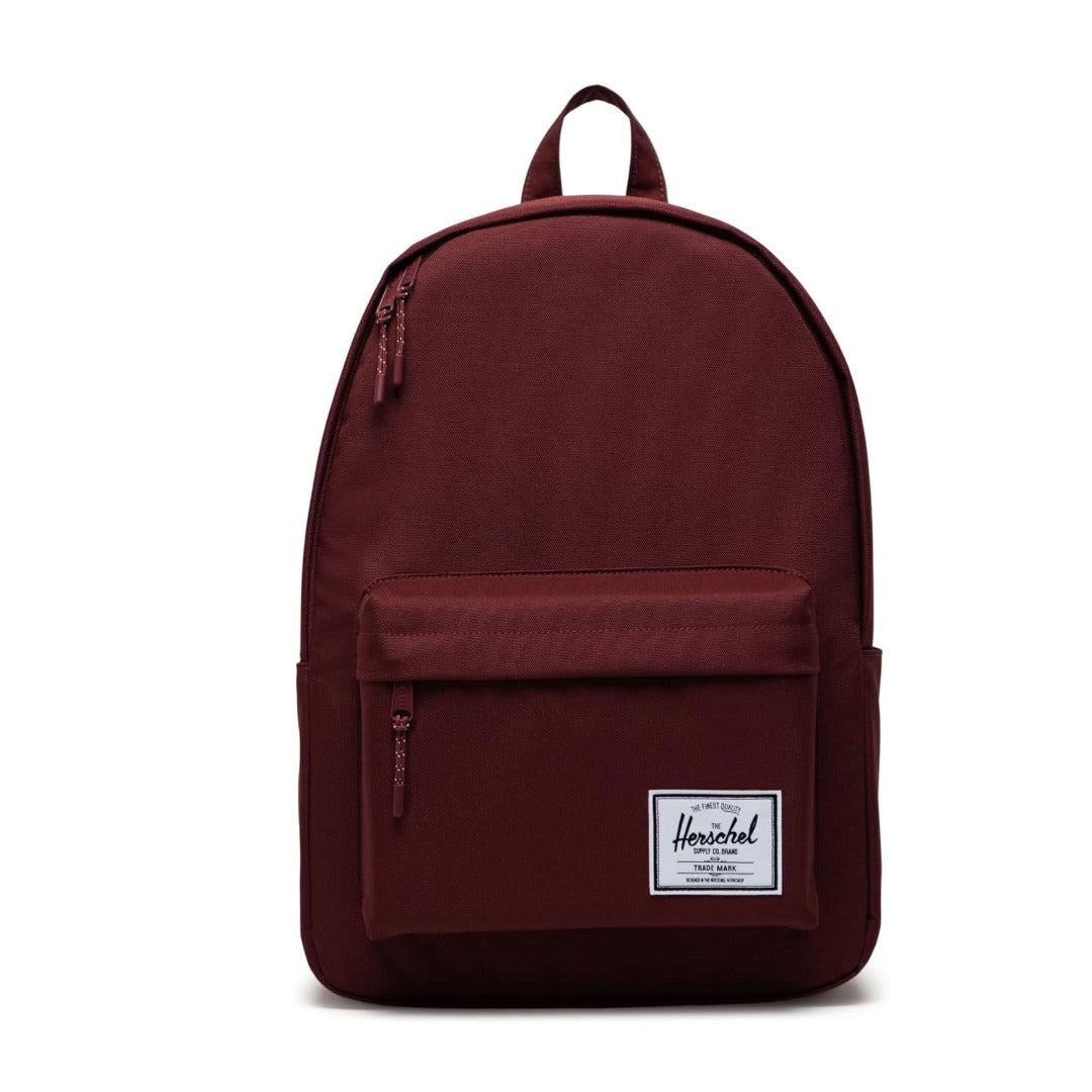 Herschel Classic X-Large backpack with a clean minimalist design, front zip pocket, and padded straps, suitable for everyday carry.