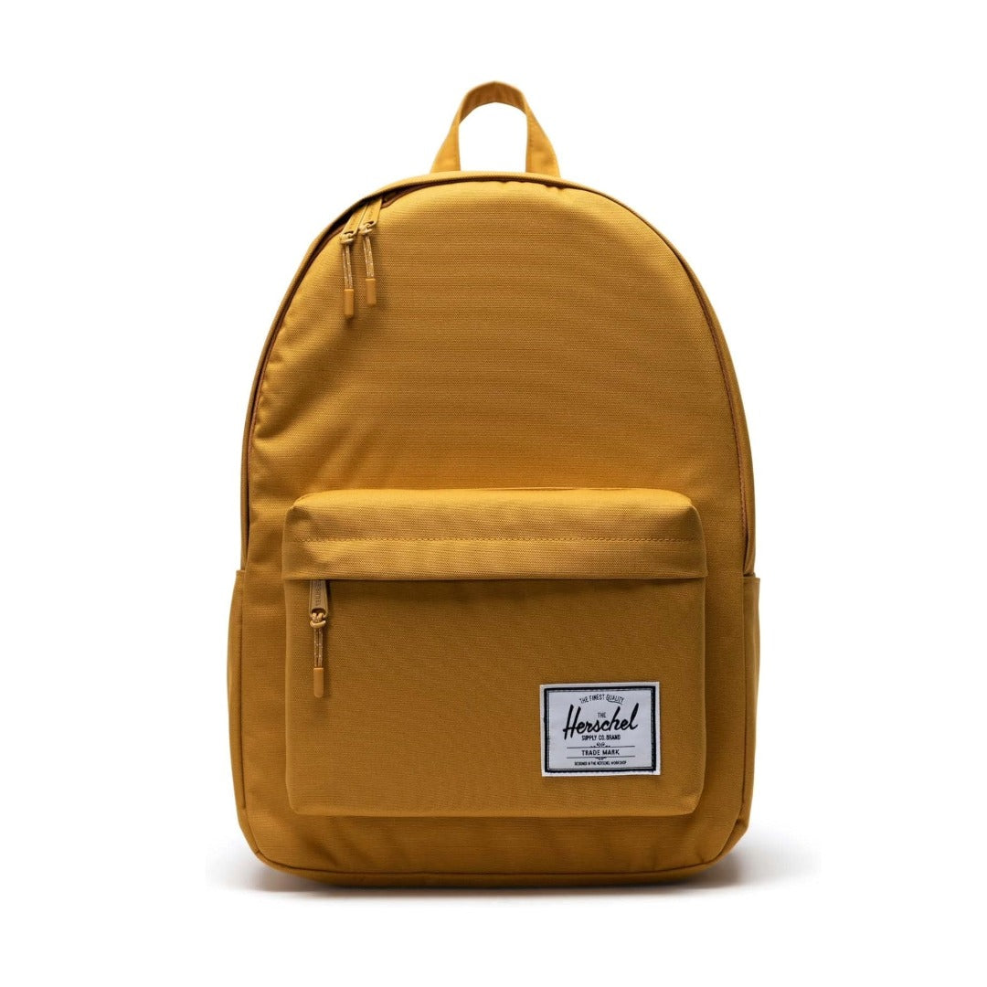 Herschel Classic X-Large backpack with a clean minimalist design, front zip pocket, and padded straps, suitable for everyday carry.