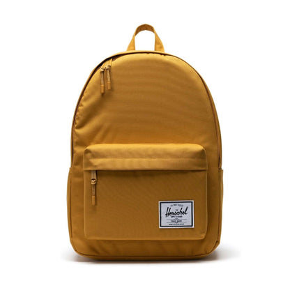 Herschel Classic X-Large backpack with a clean minimalist design, front zip pocket, and padded straps, suitable for everyday carry.