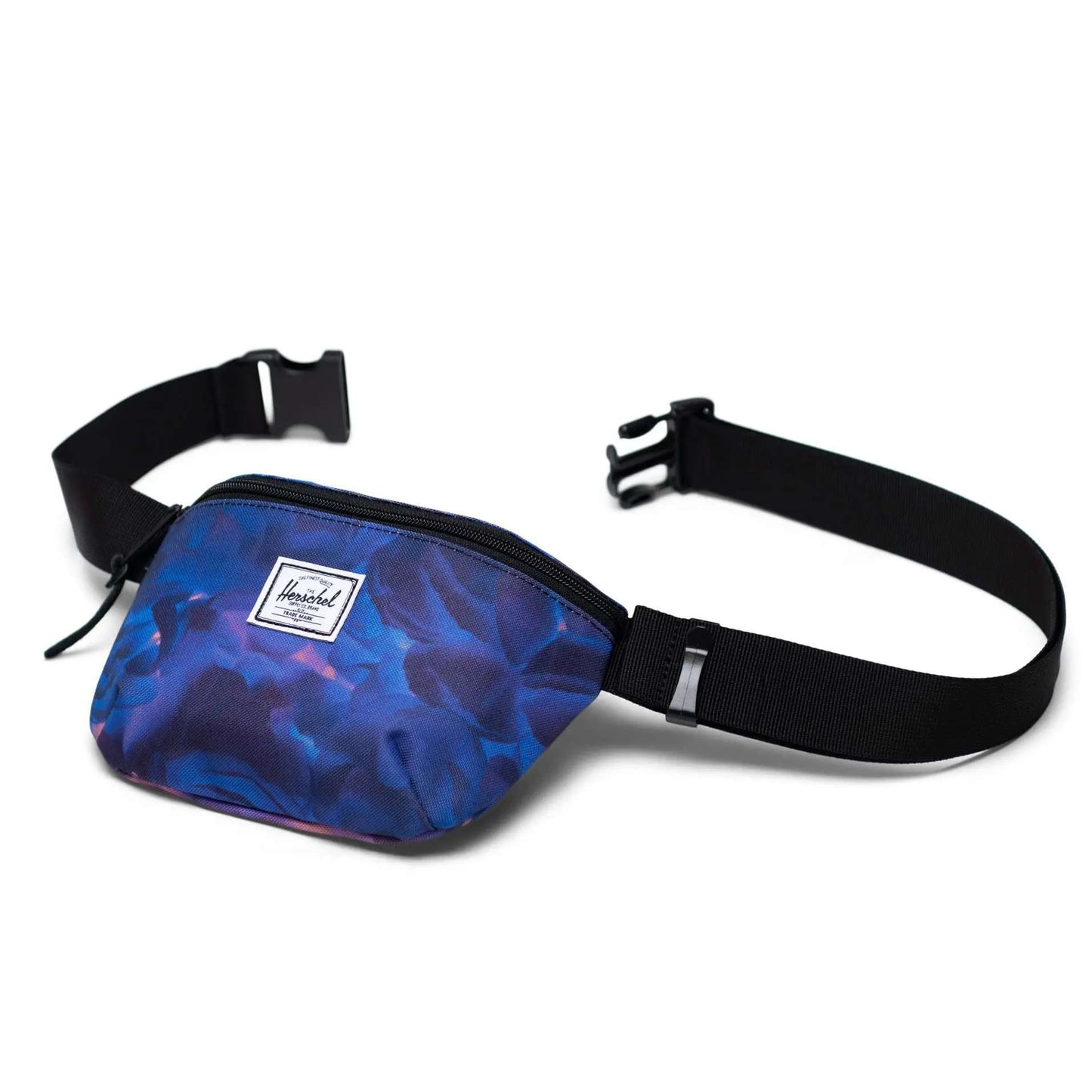 Herschel Fifteen hip pack with a slim design, adjustable strap, and zippered compartment, suitable for hands-free everyday carry.