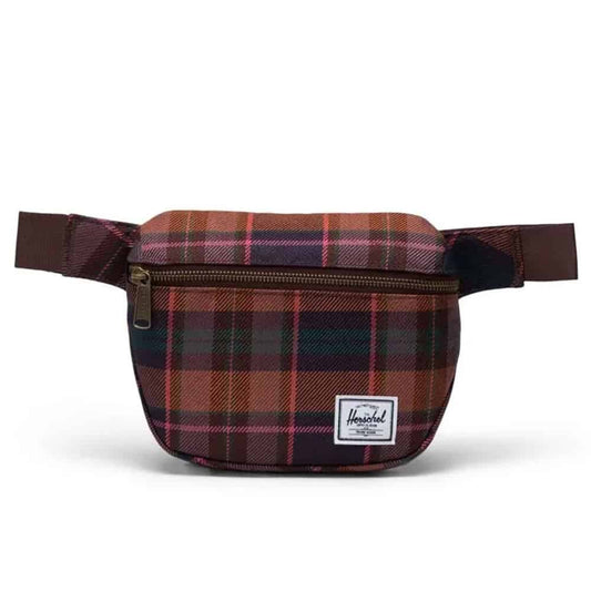 Herschel Fifteen hip pack with a slim design, adjustable strap, and zippered compartment for convenient everyday carry.