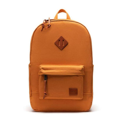 Herschel Heritage backpack made of heavy canvas, featuring a classic design, front zip pocket, and signature diamond detail for everyday use.