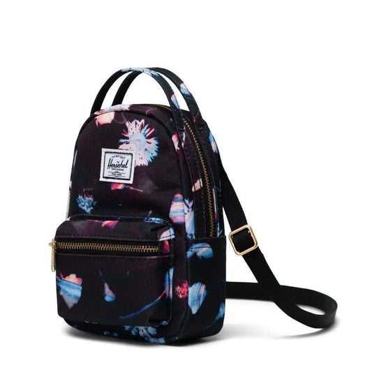 Herschel Nova crossbody bag with a compact design, adjustable strap, and zippered compartments for convenient everyday carry.