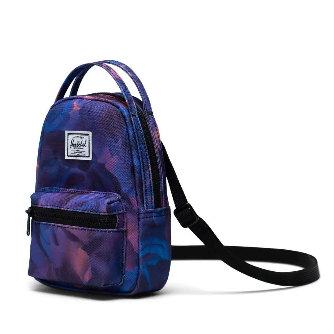 Herschel Nova crossbody bag with a compact design, adjustable strap, and zippered compartments for convenient everyday carry.