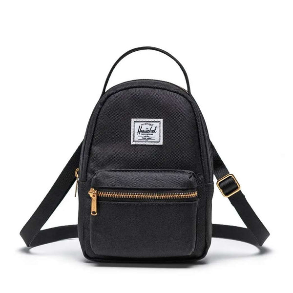 Herschel Nova crossbody bag with a compact design, adjustable strap, and zippered compartments for convenient everyday carry.