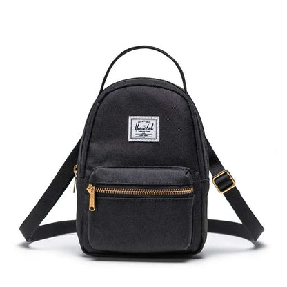 Herschel Nova crossbody bag with a compact design, adjustable strap, and zippered compartments for convenient everyday carry.