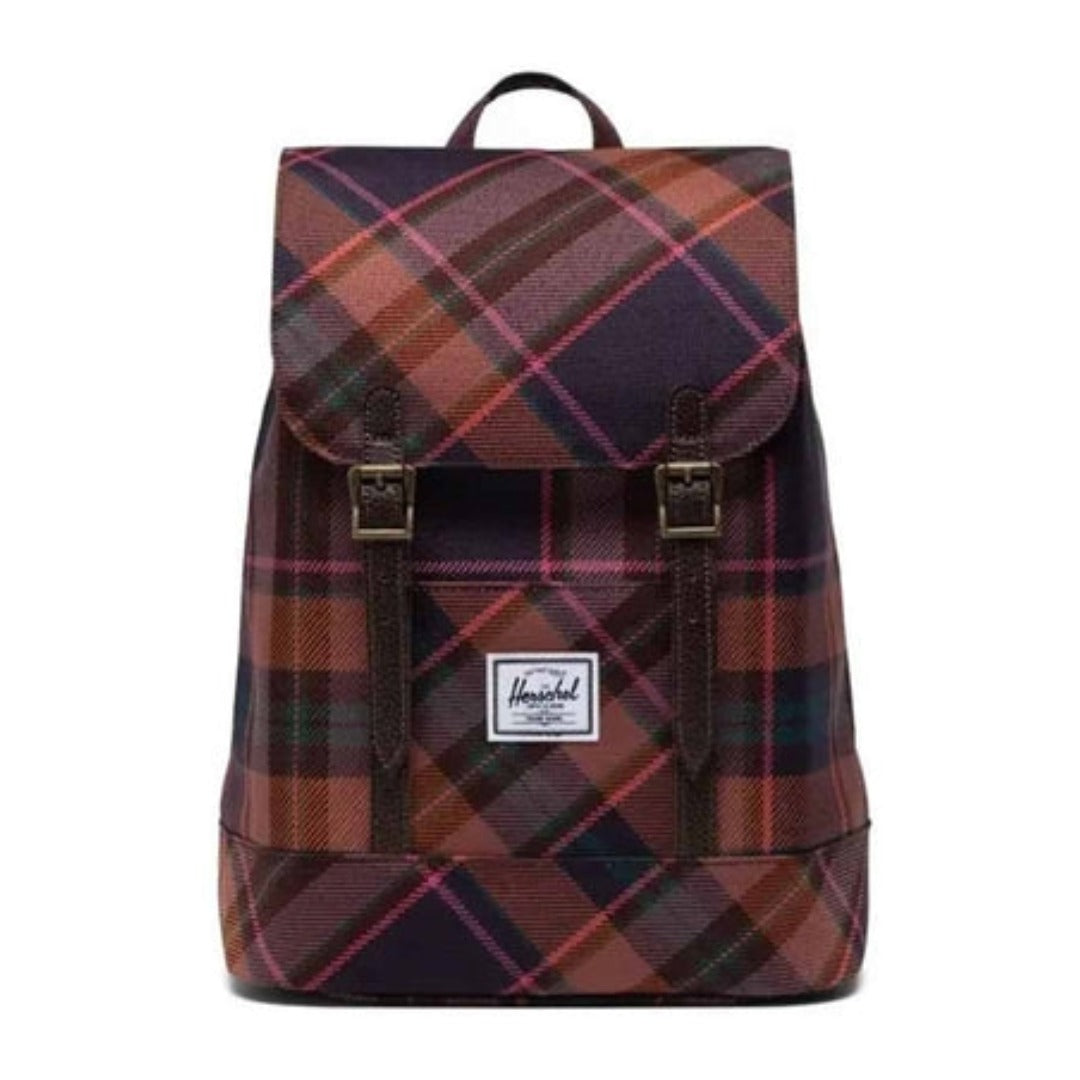 Herschel Retreat Mini backpack with a compact mountaineering design, drawcord closure, and front straps for casual everyday use.