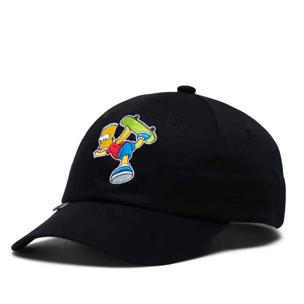 Herschel Sylas cap featuring The Simpsons graphics, with a curved brim and adjustable strap for casual everyday wear.