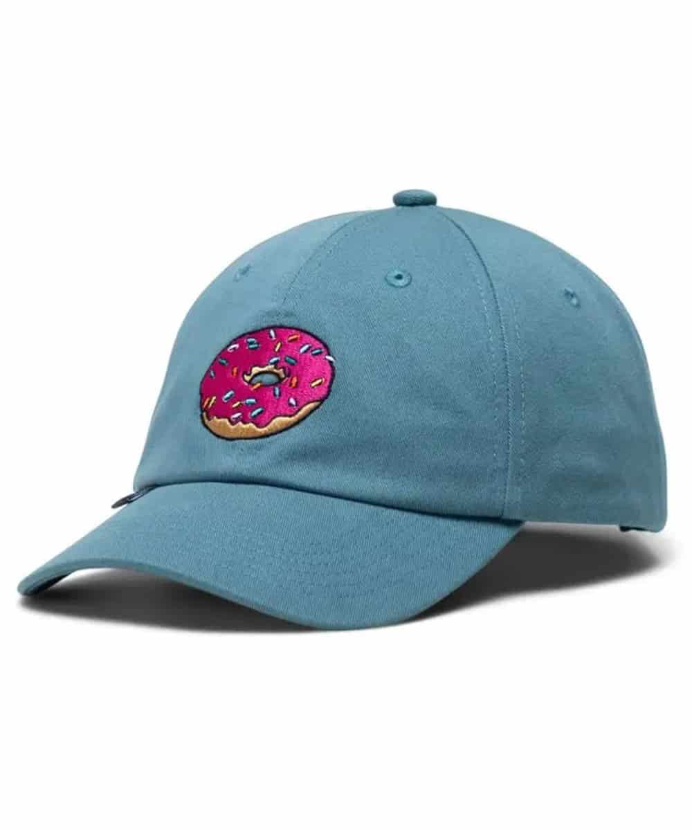 Herschel Sylas cap featuring The Simpsons graphics, with a curved brim and adjustable strap for casual everyday wear.