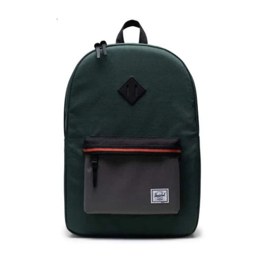 Herschel Heritage backpack with a classic design, front zip pocket, and signature diamond detail, suitable for everyday carry..
