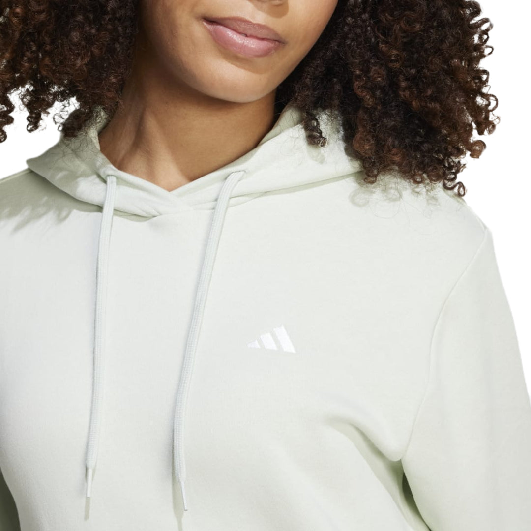 adidas Women's Essentials Small Logo Feel Cozy Hoodie in a relaxed fit, perfect for comfort and style.
