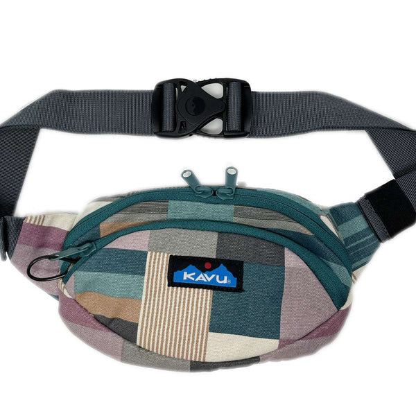 Canvas waist pack featuring an adjustable strap, multiple zippered compartments, and a compact hands-free design for travel, commuting, and everyday carry
