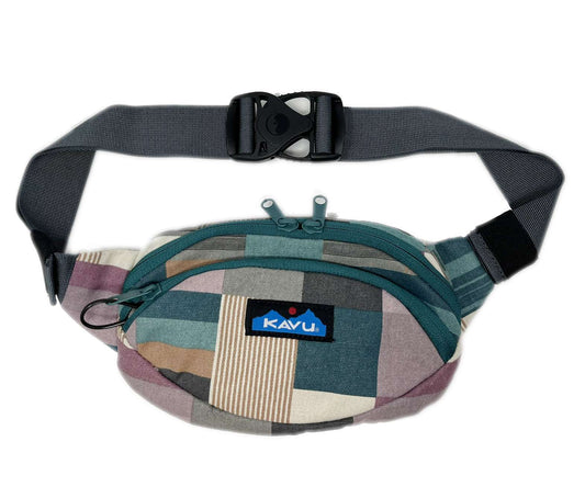 Canvas waist pack featuring an adjustable strap, multiple zippered compartments, and a compact hands-free design for travel, commuting, and everyday carry