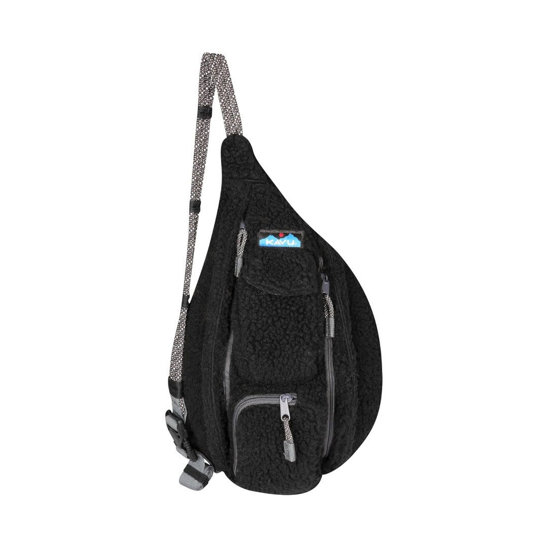 Compact fleece sling bag featuring a rope shoulder strap, multiple zippered compartments, soft textured exterior, and a lightweight crossbody design for everyday carry