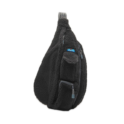Fleece sling bag featuring a soft textured exterior, rope shoulder strap, multiple zippered compartments, and a lightweight crossbody design for everyday carry