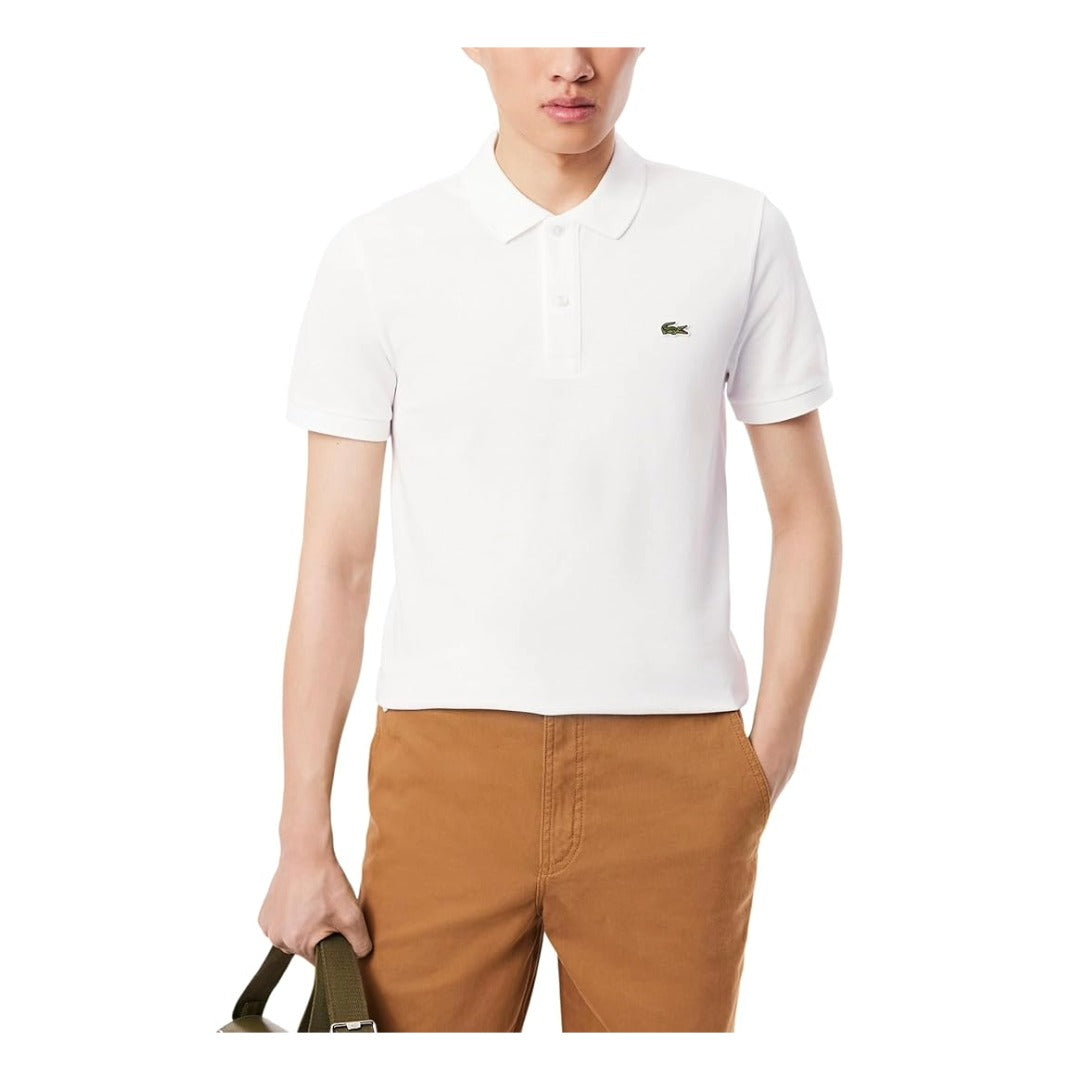 Lacoste men’s slim fit polo shirt made from petit piqué cotton, featuring short sleeves, a fitted silhouette, and signature crocodile logo.