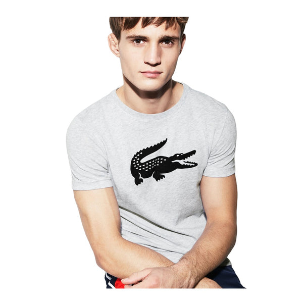 Lacoste men’s sport t-shirt with a croc graphic, short sleeves, and moisture-wicking fabric for athletic and casual use.