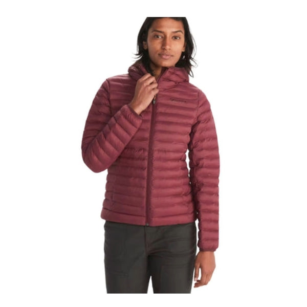 Woman wearing Marmot Echo Featherless hoodie with quilted insulation and attached hood, featuring a lightweight, packable design for cold-weather layering