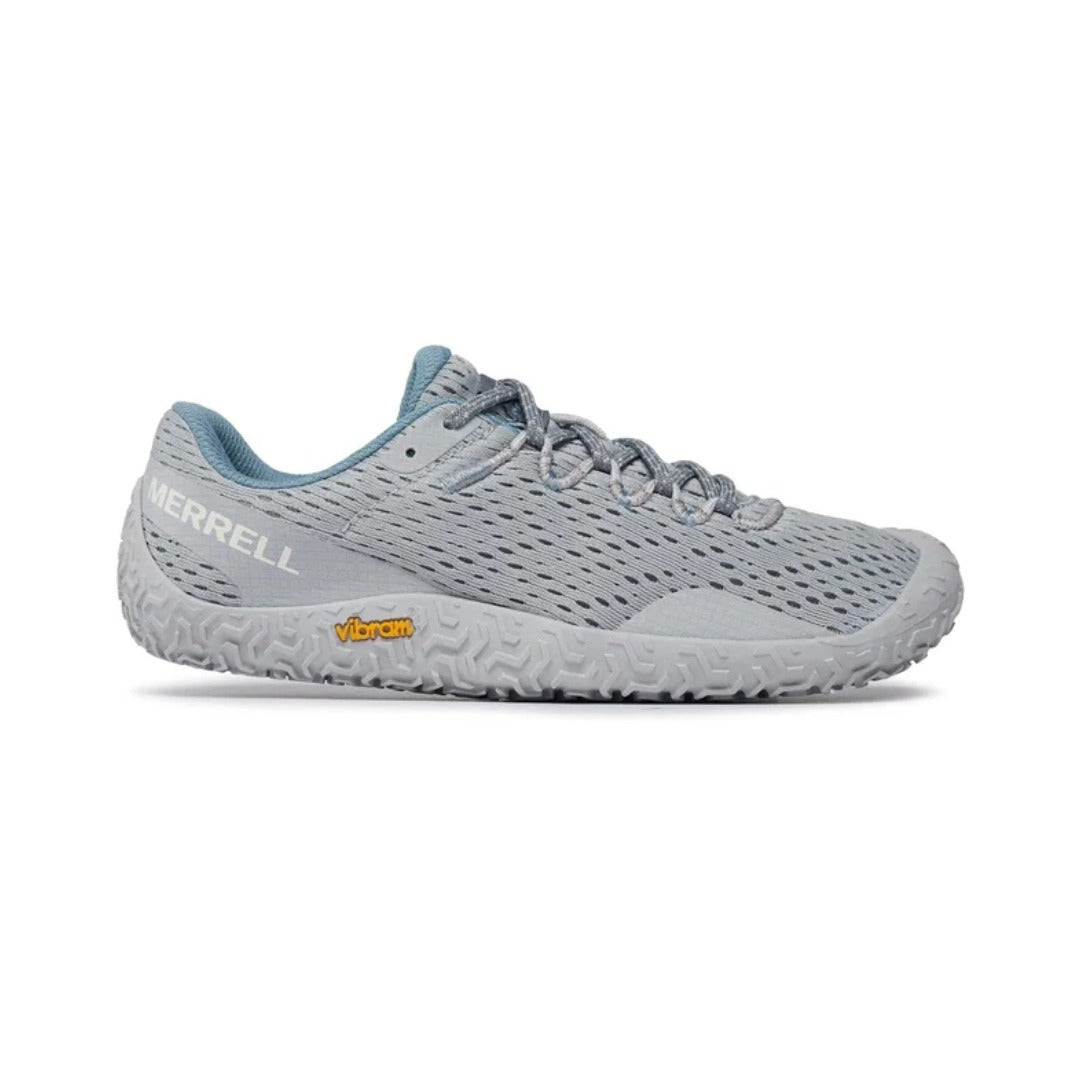 Women's lightweight minimalist trail running shoes featuring a breathable mesh upper, secure lace-up closure, flexible low-profile construction, and durable traction outsole