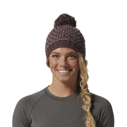 Mountain Hardwear Women’s Snow Capped™ Beanie in patterned knit with pom-pom top and soft fleece lining.