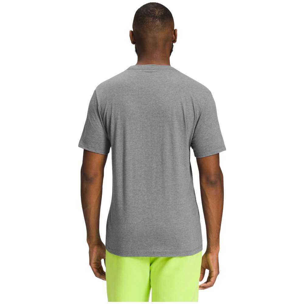 A man wearing The North Face Men's Short-Sleeve Jumbo Half Dome Tee.