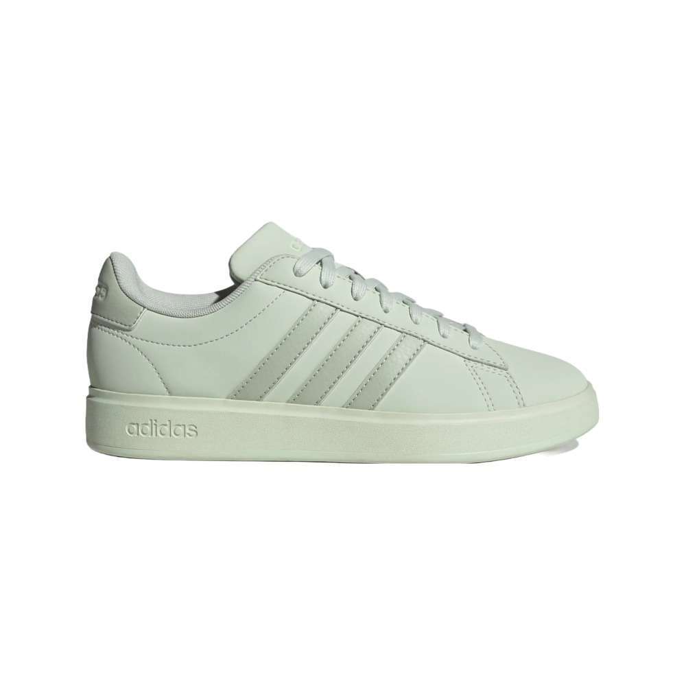 A pair of leather sneakers with Adidas stripes on the sides, featuring a comfortable and stylish design suitable for casual and athletic wear