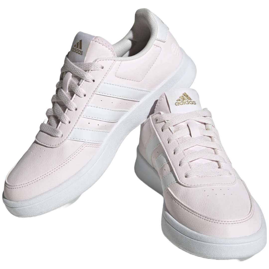 A pair of adidas Breaknet 2.0 sneakers for women in light pink. The sneakers feature a leather and synthetic upper, a rubber outsole, and the adidas logo on the side.
