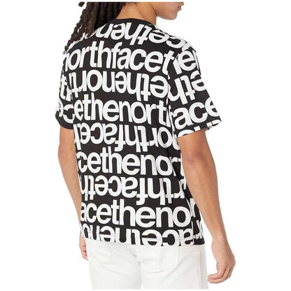 A man wearing The North Face Men's Short-Sleeve All Over Print Box Fit Tee.