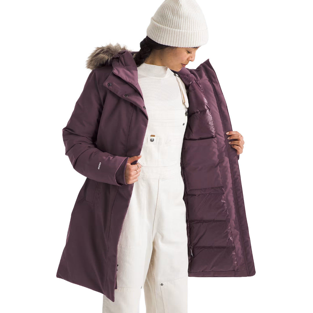 "The North Face Women's ARC Parka, lightweight waterproof jacket with a modern design, providing protection from rain and wind